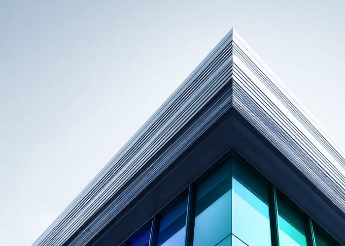 Low-angle view of a modern glass building
