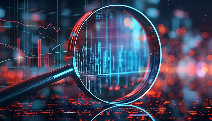 Magnifying glass highlighting digital data charts with glowing analytics background