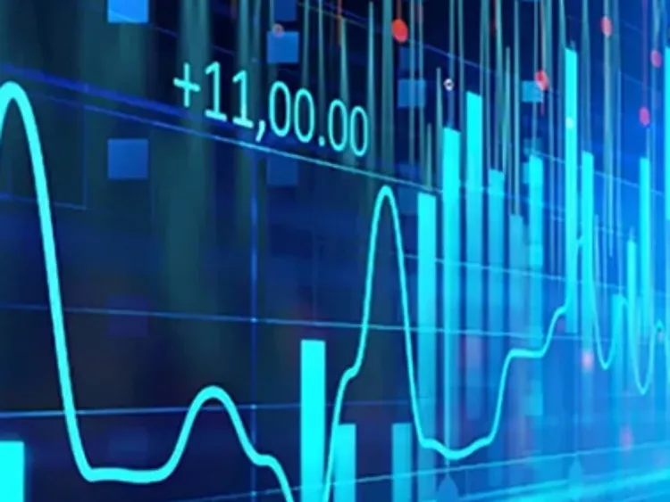Financial graph with blue bars and fluctuating line indicating market trends