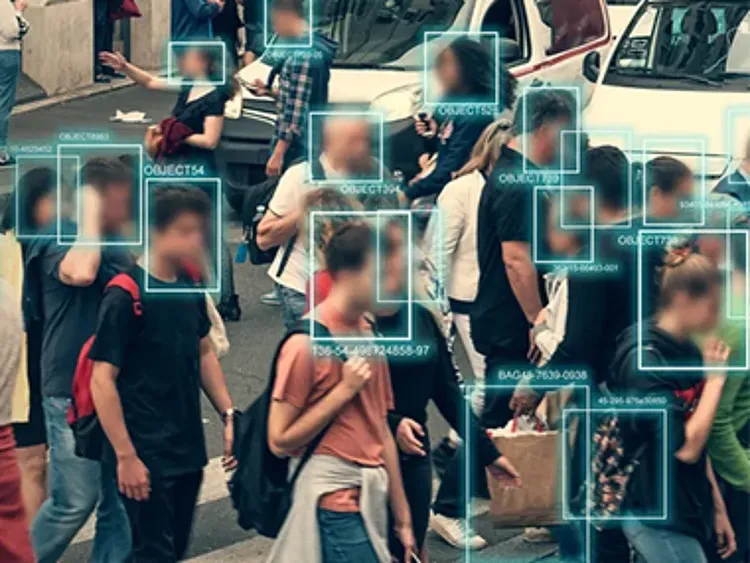 Crowd scene with facial recognition boxes identifying individuals in public