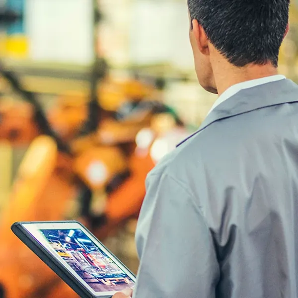 A man holding a tablet