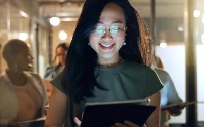 A customer checking a tablet screen