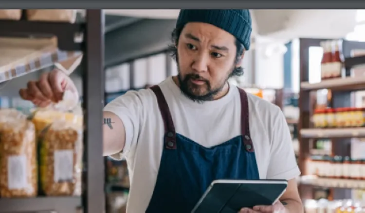 An employee taking inventory