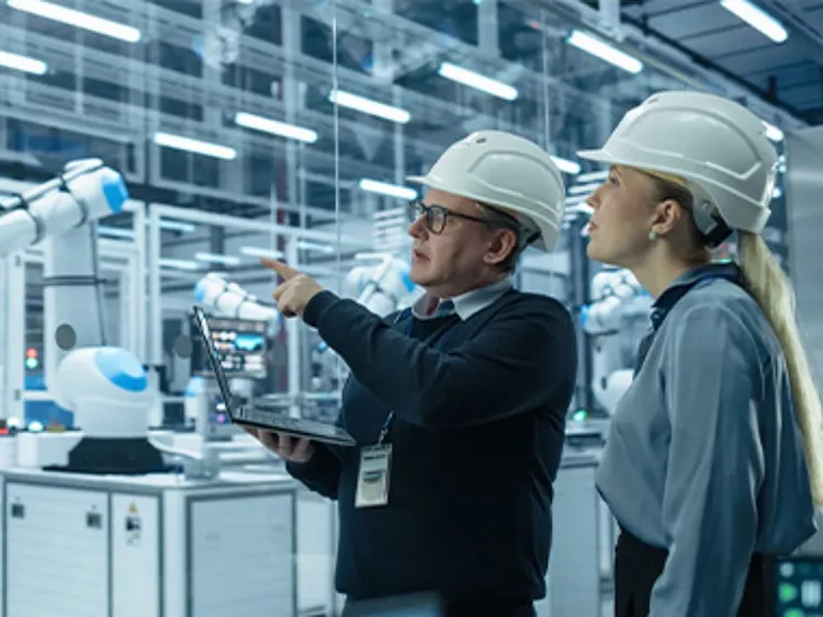 Workers wearing safety gears inside a lab