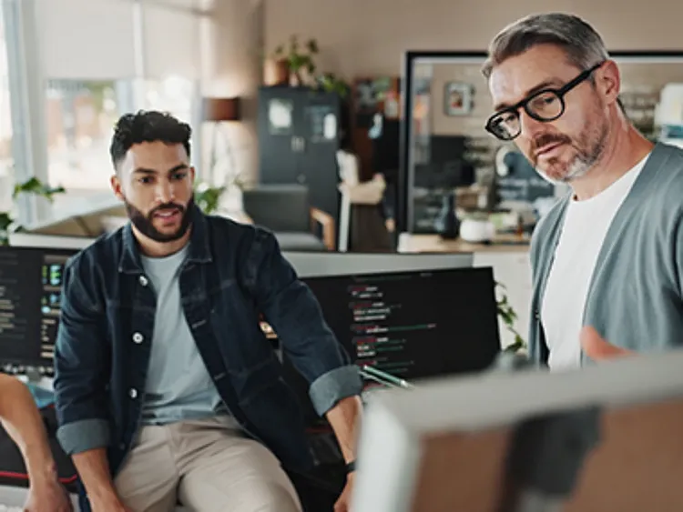 Two people discussing a project